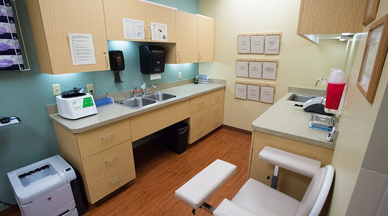 A look inside a patient exam room at ReadyCare Cottman office